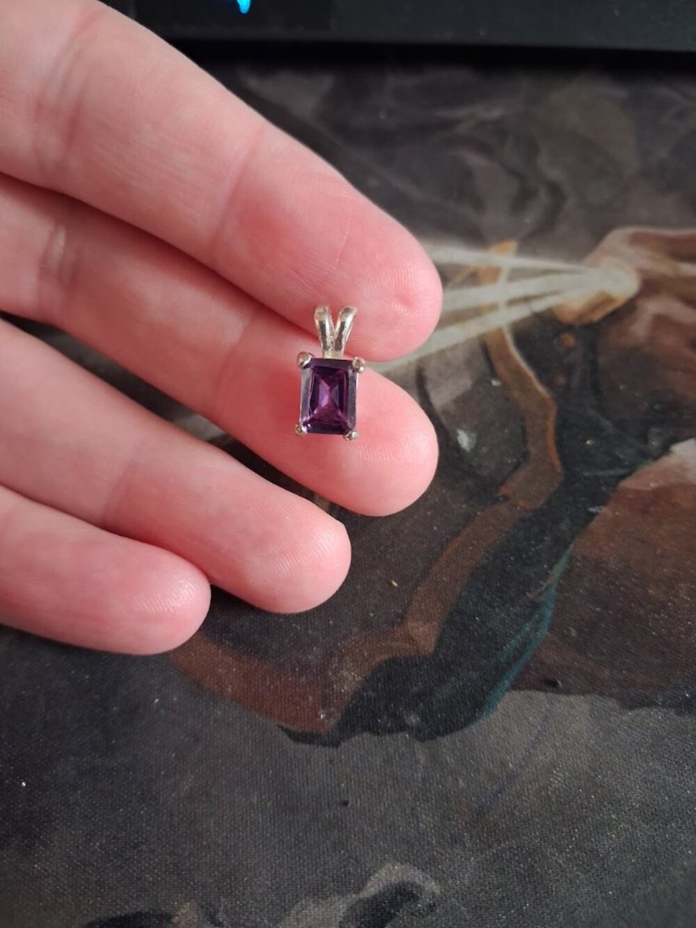 Purple stoned pendant